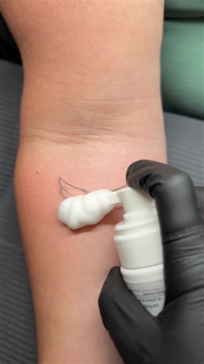 Delicate fine line tattoo Sarasota Florida Floral tattoo • lettering • micro realism • tiny tattoo • abstract tattoo • ocean tattoos • ASMR • process • matching tattoos #tattoo #finelinetattoo #sarasotatattoo #lettering #floral