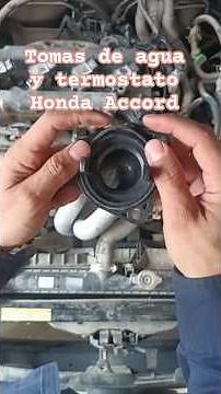 Damaged seals on the water intake and thermostat housing of the 2003 Honda Accord
