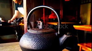 Ancient Pattern Black Cast Iron Teapot Japanese Tetsubin Tea Set for Wood Stove with Stainless Steel Infuser for Leaf Loose Tea Blooming Flower Tea 600ml 20oz hand made rotating Bokeh Background