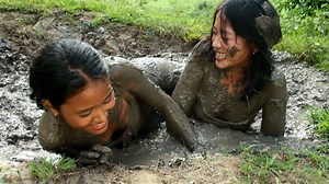 Boots and Brawl in the Mud--Jane and Carol
