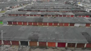 A massive area of old vintage car garage construction from the bird eye view