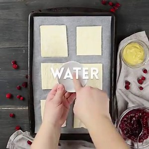 These tender Cranberry Baked Brie Bites are super easy to make using puff pastry, dijon mustard, Brie cheese, cranberry sauce, or your favorite jam. Great holiday appetizer or anytime snack! Get the Recipe! >> https://keviniscooking.com/savory-sweet-baked-brie-bites/ | Kevin Is Cooking