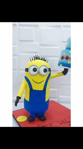296 reactions · 18 comments | Minions gravity defying cake PART 2 If you've ever wondered how to sculpt a gravity defying cake, this video shows the process. P.S. Be sure to take a hands-on class on gravity defying cakes before attempting to make one for a customer. Video Credit: @trendycakeaffairs #learncakes #gravitydefyingcake #gravitydefyingcakes #gravitydefying #kiddiescake #cakesforkids #naijabakers #worldbakers #lagosbaker | Learn Cakes and Baking | Facebook