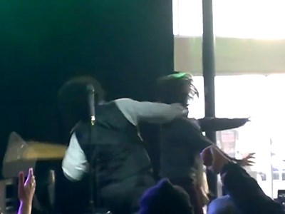 Raw: Rapper Afroman hits fan during concert