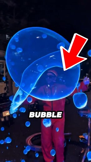 This Street Artist Creates Magical Neon Bubbles!