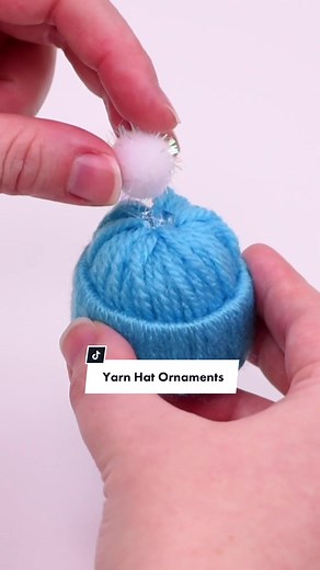 These yarn hat ornaments are SO CUTE and they’re unbelievably easy to make! 😍Tie scrap pieces of yarn around a toilet paper roll to create these festive mini winter hats. No sewing or knitting skills required! . . . #christmascrafts #christmascraft #christmasornaments #diyornaments #diychristmasdecor #diychristmascrafts #homemadeornaments #handmadeornaments #kidscrafts #craftymom #craftsforkids