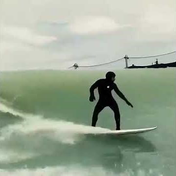 Lewis Hamilton surfing at Kelly Slaters Surf Ranch