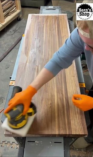 Putting the finish on a walnut butcher block counter top