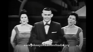 Born on this day—April 1st, 1934—Jim Ed Brown brought a warm, smooth voice to country music that still echoes in the hearts of those who know the power of harmony. As the lead vocalist for The Browns, alongside his sisters Maxine and Bonnie, Jim Ed helped create a sound that was both timeless and deeply American. Here they are performing “The Three Bells”—a song that became not just their signature hit, but a moment of pure beauty in the history of country and pop music. Released in 1959, this h