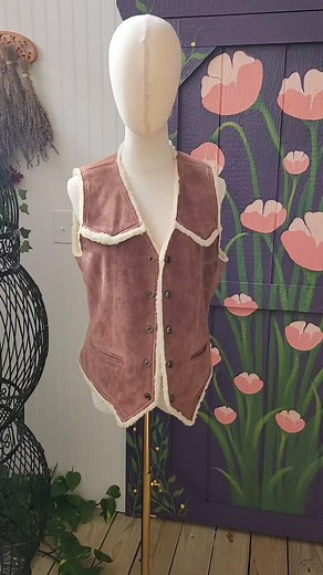 1970s women's fitted reversible vest, leather on one side, shearling on the other side. Item name: Felicity Vest | GeekBetty | Facebook