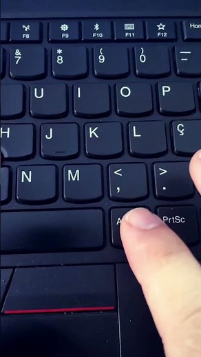 Inserir barra e interrogação no thinkpad .