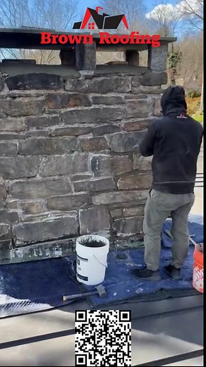 Our expert masons, Tony & Miri on site repointing this massive chimney, ensuring it is ready for the coming winter. Brown Won't Let You Down! #brownwontletyoudown #chimneyrepair #chimneyrepointing | Brown Roofing, Inc