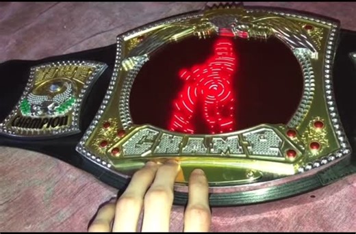 Christina Bell on Instagram: "I actually forgot I even had this it’s probably rare by now !!! Omg this Wwe belt is so vintage I was doing spring cleaning early look what I found in my closet this Wwe belt from the 2000’s this is so freaking cool !!! The sound effects is so cool they don’t make them like this anymore!! I miss this wrestling era I’m a huge wrestling fan as you guys can tell !! Who else remembers this cool freaking belt has anyone ever seen this before? #wwe #wwebelt #wwf #wrestlin