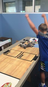 Robot Academy Summer Camper designs a robot to sweep up batteries. Watch him cheer when it works! Camps in Westerville, Dublin and Gahanna for age groups 4 to 8 and 9 to 16. | Robot Academy