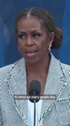 Michelle Obama sings Barack Obama's praises during presidential center ceremony