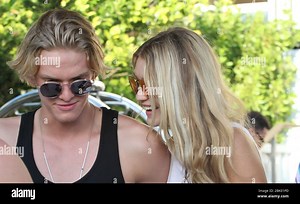 MIAMI BEACH, FL - MARCH 14: Victoria's Secret model Gigi Hadid, Rachel Hilbert and Singer Cody Simpson party on South Beach on March 14, 2015 in Miami Beach, Florida.   People:  Gigi Hadid, Cody Simpson Stock Photo - Alamy