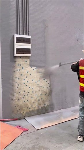 Spraying the wall with a coating ensures the cement reaches every surface evenly during application