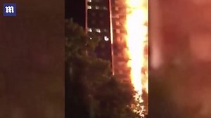 Screams heard as west London tower block is engulfed in flames