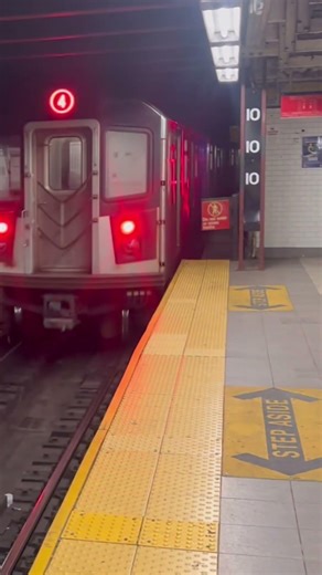 Woodlawn bound R142A 4 train departing 59th Street
