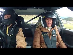Woman Freaks Out During Fast Ride in Race Car - 986663