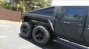 The Apocalypse HellFire - this 6 wheel drive truck is finished in black Kevlar coating and has lime green interior on the seats/dash/ceiling/ armrest. #6x6 #offroading #offroad #stockmarket #dreamcar #dreamcars #truck | Apocalypse Manufacturing