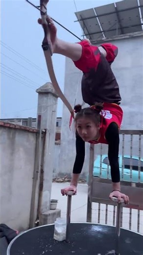 Maru's Impressive Handstand Archery Skills ArcheryMagic