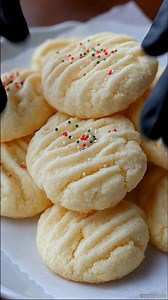 Melt‑in‑Your‑Mouth Whipped Shortbread Ingredients 2 cups (≈ 250 g) all-purpose flour 2 tablespoons (≈ 15–20 g) cornstarch A pinch of salt (if butter is unsalted) ...... Full Recipe in Coʍmеոτ 💬 | Recipes Realm