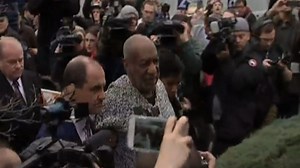 Bill Cosby arrives at court for arraignment