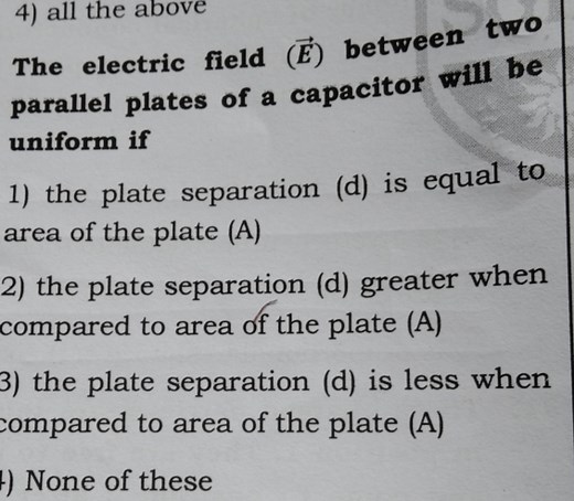 The electric field (\vec{E}) between two parallel plates of a c... | Filo