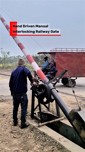 Manual interlocked level crossing gate ensuring railway safety.#shorts #trains #railway #foryoubage