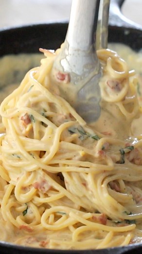 Pasta tossed in a rich, creamy sauce with crispy pancetta and loads of Parmesan. This Creamy Carbonara isn’t traditional—but it is ridiculously delicious. Silky, savory, and done in under 30. Recipe 👉 https://www.jocooks.com/recipes/creamy-carbonara/ | JoCooks