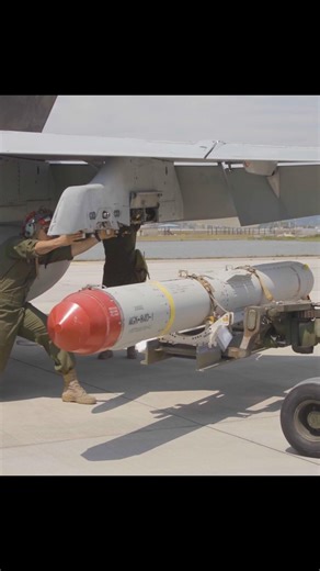 Marines load AGM-84D Harpoon missiles