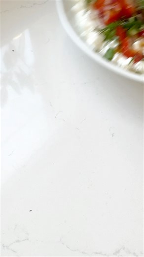 This cottage cheese salad combines fresh veggies and herbs with cottage cheese for a simple, yet flavorful salad that’s low in calories, but packed with 29 grams of protein. https://www.eatingbirdfood.com/cottage-cheese-salad/ | Eating Bird Food