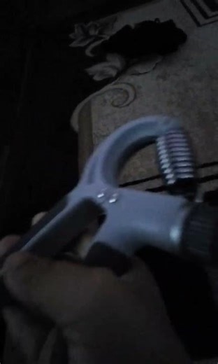 Trying the strongest level of hand grip 60kg