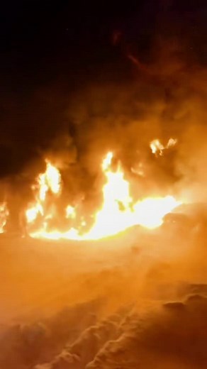 Firefighter Battling Intense Flames in Action