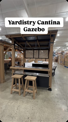 Cozy Nests on Instagram: "Upgrade Your Backyard with This Stunning Cantina Gazebo from Costco! Transform your outdoor space with the Yardistry 7.6’ x 7.6’ Cantina Gazebo! ☀️ Made from 100% certified wood, this gorgeous gazebo comes with aluminum cabinets, two wooden stools, and tons of storage. Everything is precut and pre-drilled, making assembly easier! Perfect for entertaining, relaxing, or creating the ultimate backyard bar setup. 🍹🏡 Grab yours now at Costco for $1799.99 before they’re gon