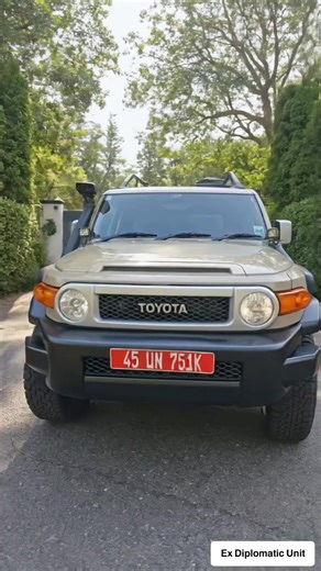 For Sale Ex UN 2014 Toyota FJ Cruiser 🔹𝗘𝗻𝗴𝗶𝗻𝗲: 𝟒.𝟎𝐋 𝐕𝟔 (𝟏𝐆𝐑-𝐅𝐄) 𝐰𝐢𝐭𝐡 𝐃𝐮𝐚𝐥 𝐕𝐕𝐓-𝐢 𝐞𝐧𝐠𝐢𝐧𝐞 𝐛𝐚𝐲 featuring a visible 𝐊&𝐍 𝐫𝐚𝐭𝐢𝐧𝐠 𝐚𝐢𝐫 𝐟𝐢𝐥𝐭𝐞𝐫 for 𝐚𝐝𝐝𝐞𝐝 𝐡𝐨𝐫𝐬𝐞𝐩𝐨𝐰𝐞𝐫 and an 𝐨𝐢𝐥 𝐜𝐚𝐭𝐜𝐡 𝐜𝐚𝐧 for engine longevity 🔹𝗙𝘂𝗲𝗹 𝗧𝘆𝗽𝗲: Petrol 🔹​𝗧𝗿𝗮𝗻𝘀𝗺𝗶𝘀𝘀𝗶𝗼𝗻: 5 speed Automatic 🔹𝗣𝗲𝗿𝗳𝗼𝗿𝗺𝗮𝗻𝗰𝗲 𝗦𝘄𝗶𝘁𝗰𝗵𝗲𝘀: A-TRAC, Rear Diff Lock and Parking Sensor buttons confirming this is a high-spec model. 🔹𝗜𝗻𝘁𝗲𝗿𝗶𝗼�