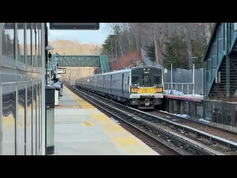 Two trains arrive and depart at Cold Spring Harbor in both directions