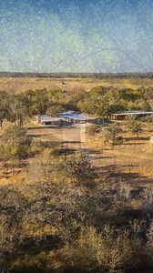 The 4E Gentleman’s Ranch offers 70 acres of native brush country blended with open pockets and clearings. Two modern modular homes serve as headquarters, each with covered porches, decks, and an inviting outdoor fireplace. A 70×50 workshop with lean‑to and two conex containers provides ample space for projects and storage. Water resources include two ponds fed by runoff and an existing well, while utilities deliver electricity, water, and internet options including Starlink. Six blinds and twelv