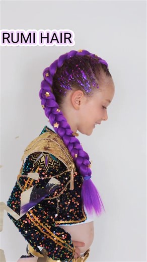 Check Out Our Rumi Look! 💜✨ We’ve recreated Rumi’s Signature Braid using our vibrant purple extensions, shimmering glitter, sleek purple wax, and golden charms — everything you need for that bold, magical K-pop style! 🌟 👉 Shop the full Rumi look now: https://www.oceanwavebraids.com.au/products/k-pop-demon-hunter | Ocean Wave Braids