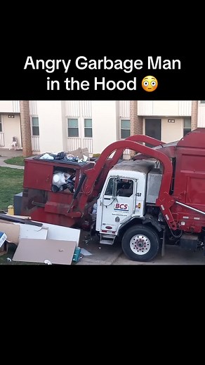 Truck Struggles with Full Dumpsters at Apartment Complex