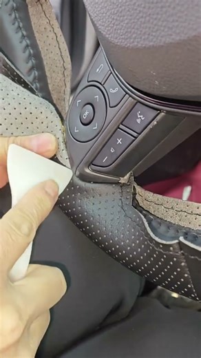 Car steering wheel leather cover sewing by hand.