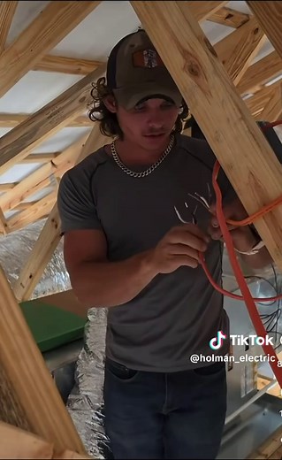 Electrician Installs Electrical With Breaker On