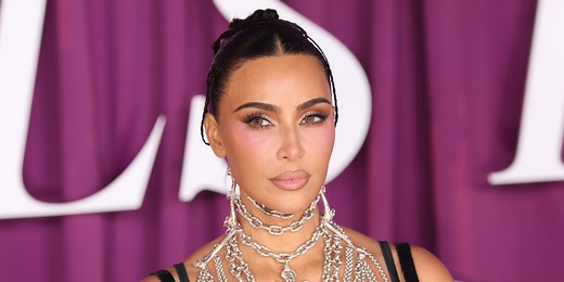 Kim Kardashian Wears Nothing but Body Paint to Debut Polarizing '90s Hair Transformation