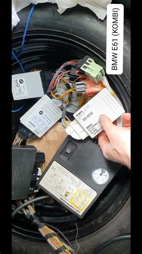BMW E60 E61 MODULE LOCATION.