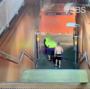 A drunken man has caught the eye of rail workers on cctv after causing a disturbance on the platform. | SBS Australia