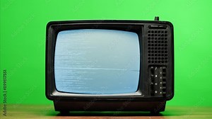 Retro Style TV Set with Green Screen chroma key background, vintage 60s analog television with grain and noise.