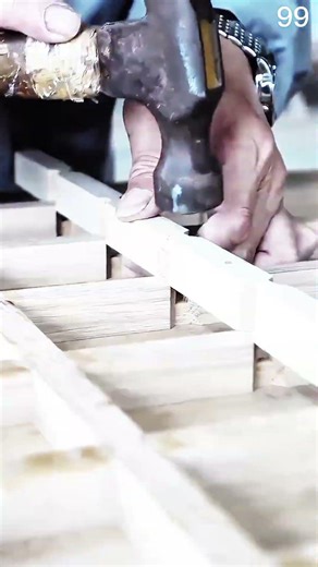 Wooden lattice grid rests across concrete workshop floor