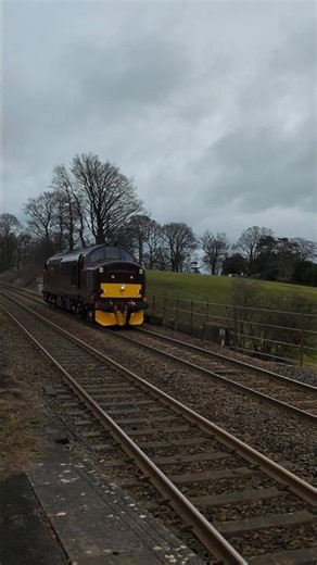 Train Tone Shorts 37 668 with two tone passing through Long Preston bound for Carnforth Steam Town