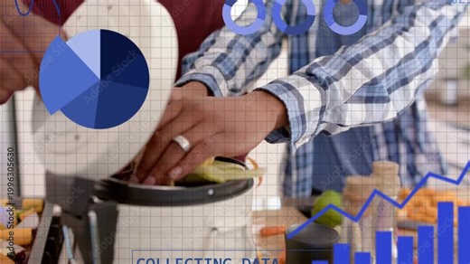 Two men prepping food at kitchen counter, one feeding stalk into processor, charts collecting data